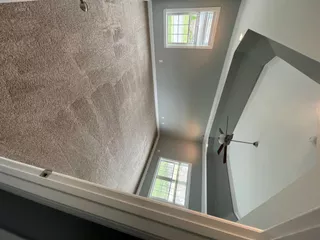 Clean staircase and upstairs loft after house cleaning