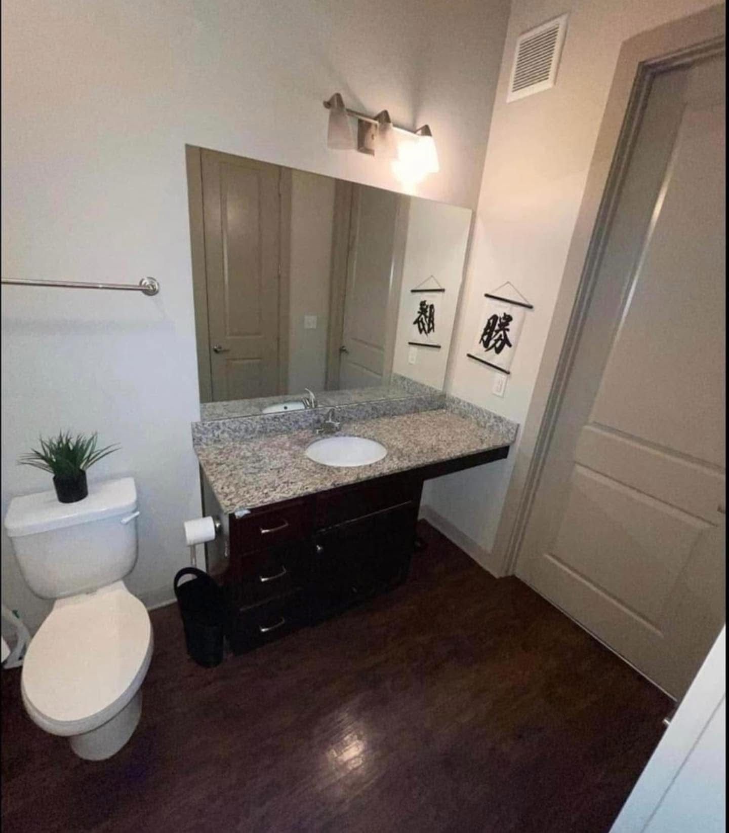 Same bathroom after cleaning, tidy and spotless